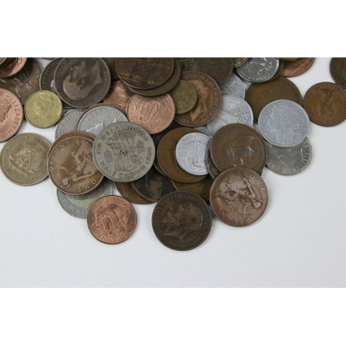 9 - A collection of British pre decimal and world coins together with a small selection of banknotes.