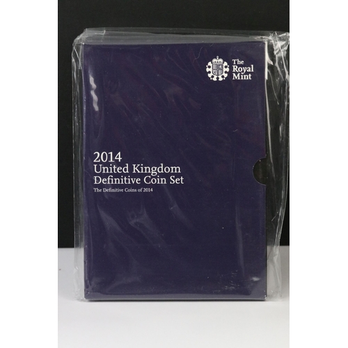 76 - A collection of four Royal Mint United Kingdom brilliant uncirculated annual coin year sets to inclu... 