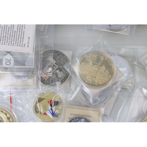 70 - A large collection of commemorative collectors coins / medallions together with a collection of Brit... 