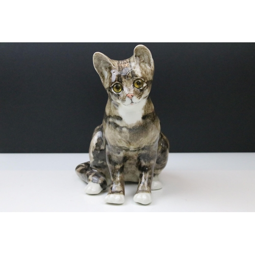 11 - Pair of Winstanley Tabby side angle cat figurines with yellow glass eyes, signed to bases, approx. H... 