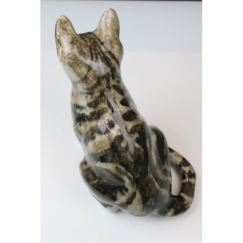 11 - Pair of Winstanley Tabby side angle cat figurines with yellow glass eyes, signed to bases, approx. H... 