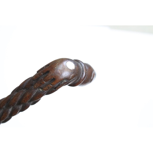 118 - 19th century shark vertebrae walking stick with carved wood sections and carved fish head handle