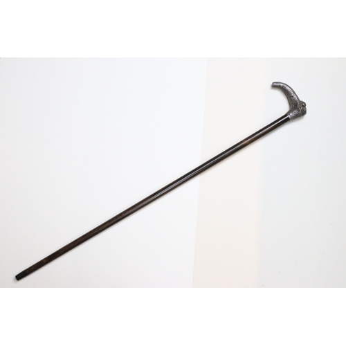 120 - Silver hallmarked handle walking stick cane modelled in the form of a resting dog on a branch, H 92c... 