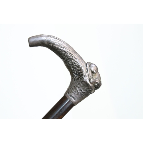 120 - Silver hallmarked handle walking stick cane modelled in the form of a resting dog on a branch, H 92c... 