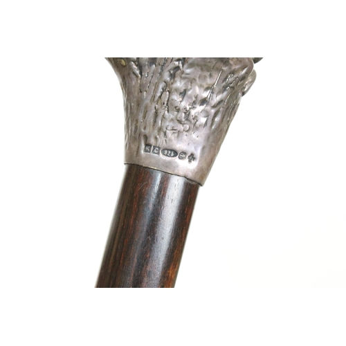 120 - Silver hallmarked handle walking stick cane modelled in the form of a resting dog on a branch, H 92c... 