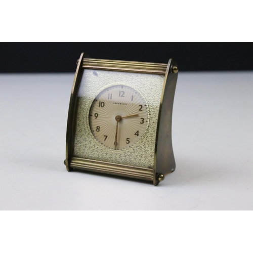 123 - Three mid 20th Century table clocks to include Ingersoll, Metamic and Tempora. Largest measures 21.5... 