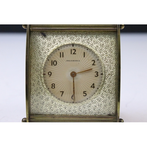 123 - Three mid 20th Century table clocks to include Ingersoll, Metamic and Tempora. Largest measures 21.5... 