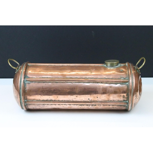 131 - 19th century copper cylindrical carriage foot warmer with brass cap and twin brass loop handles, 34c... 