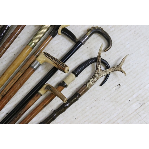 188 - Assorted collection of walking stick canes with antler and horn stylised handles