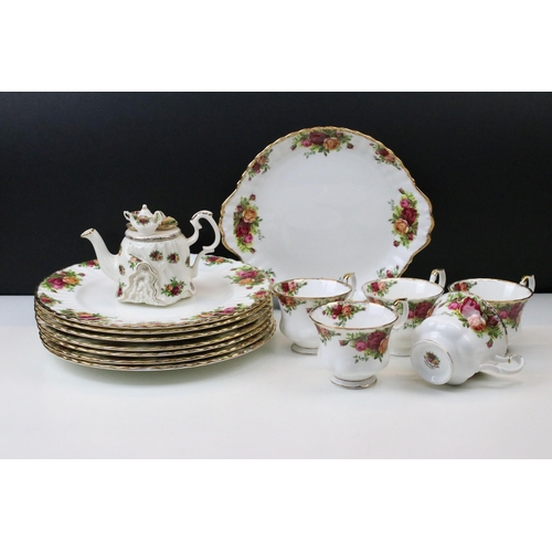 23 - Selection of Royal Albert 'Old Country Roses' to include five tea cups, cake plate, seven dinner pla... 