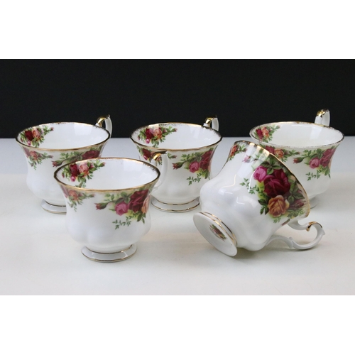 23 - Selection of Royal Albert 'Old Country Roses' to include five tea cups, cake plate, seven dinner pla... 