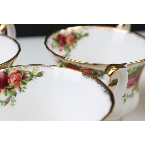 23 - Selection of Royal Albert 'Old Country Roses' to include five tea cups, cake plate, seven dinner pla... 