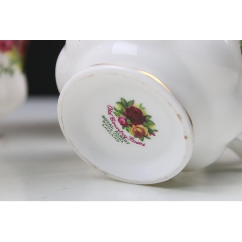 23 - Selection of Royal Albert 'Old Country Roses' to include five tea cups, cake plate, seven dinner pla... 