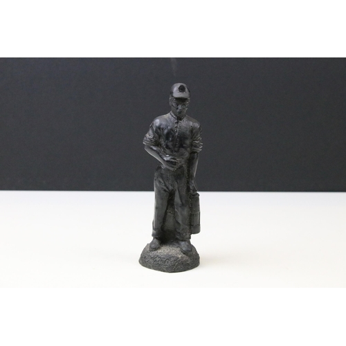 37 - Group of cast sculptures to include a bronze Peter Hicks limited edition of a gentleman on an integr... 