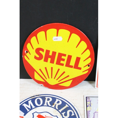 377 - Selection of metal reproduction vintage advertising signs to include Shell, Morris sales and service... 