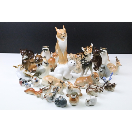 38 - Vintage USSR porcelain animal figurines to include lynx, polar bear, deer, bear, baby leopard and ti... 