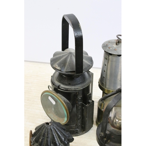 390 - Quantity of miners safety lamp lanterns to include makers Eccles 'The Protector', Ackroyd & Best tog... 