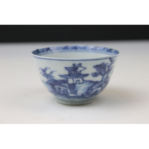 4 - Nanking Qing dynasty cargo tea cup and saucer having blue under glazed decoration featuring pagoda s... 