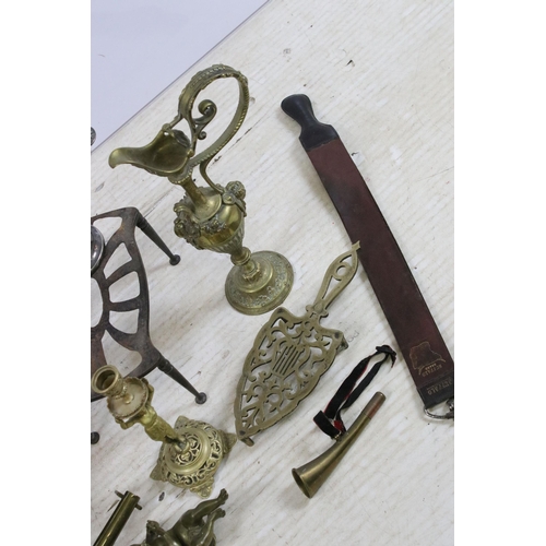 400 - Quantity of metal ware items to include an Albatross iron, fireside trivets, silver plate three bran... 