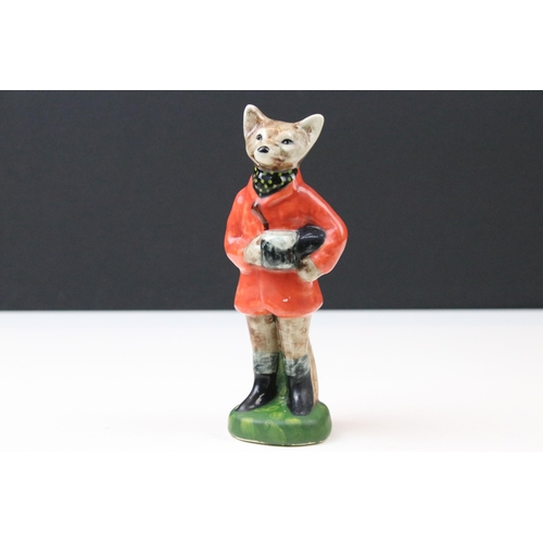 44 - Group of four fox huntsman related figures to include Little Acorns 'Foxy Gent', Staffordshire fox f... 