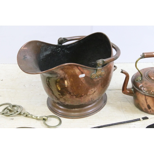 444 - Copper coal scuttle and copper teapot together with brass ware to include decorative plate, fireside... 