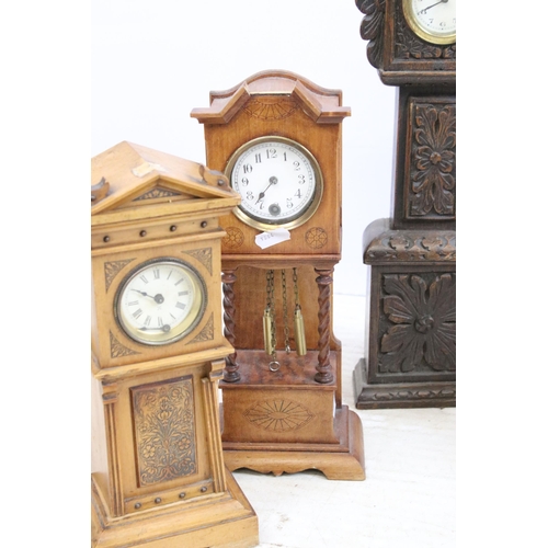 448 - Assortment of clocks to include an Art Deco wooden example together with a Napoleon hat carved wood ... 