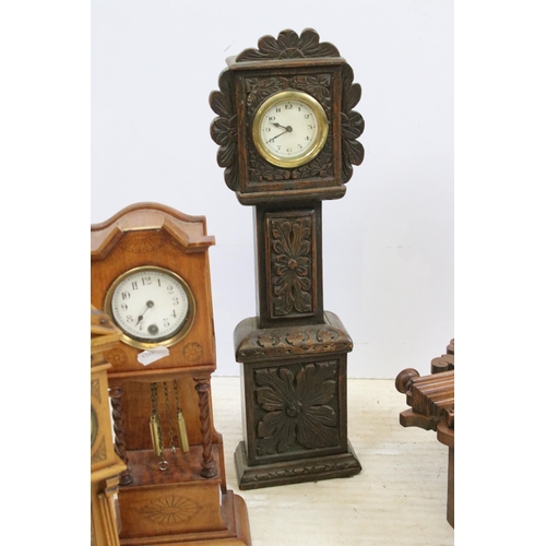 448 - Assortment of clocks to include an Art Deco wooden example together with a Napoleon hat carved wood ... 