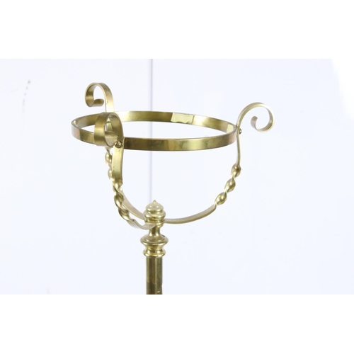 454 - Brass floor standing adjustable oil lamp stand with scroll and twist detailing, H 120cm (lowest)