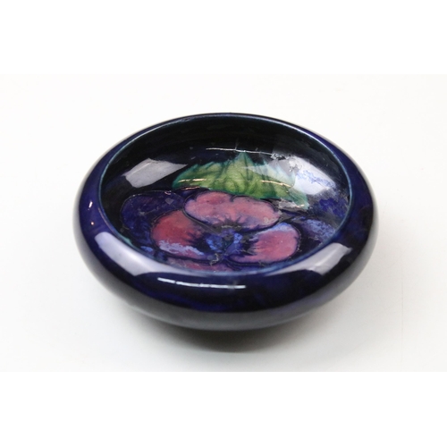 46 - Small Moorcroft pansy pattern inverted rim pin dish, diameter 11cm