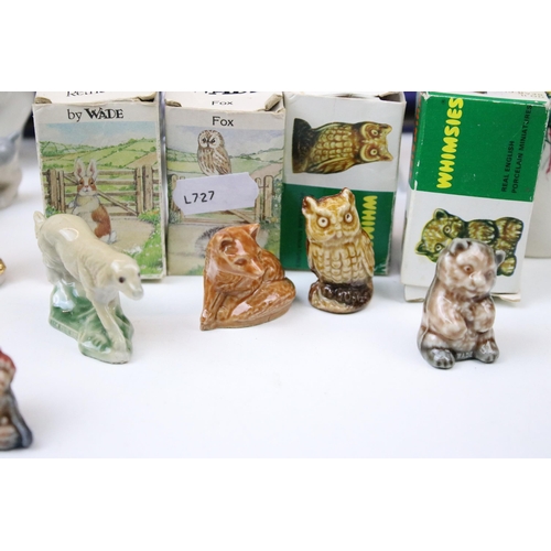 49 - Mixed collection of ceramics to include Wade swan and 50th anniversary dogs, posey vase, boxed Whims... 