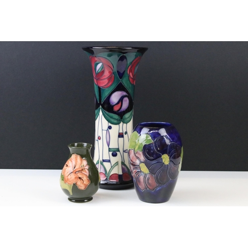 5 - Three Moorcroft vases to include a rose pattern trumpet vase in tribute to Charles Rennie Mackintosh... 