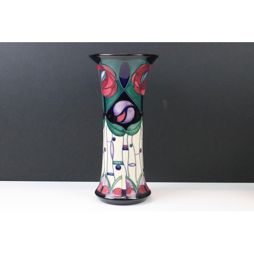 5 - Three Moorcroft vases to include a rose pattern trumpet vase in tribute to Charles Rennie Mackintosh... 