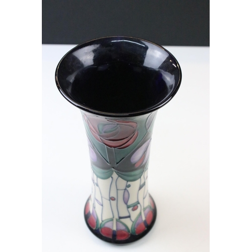 5 - Three Moorcroft vases to include a rose pattern trumpet vase in tribute to Charles Rennie Mackintosh... 