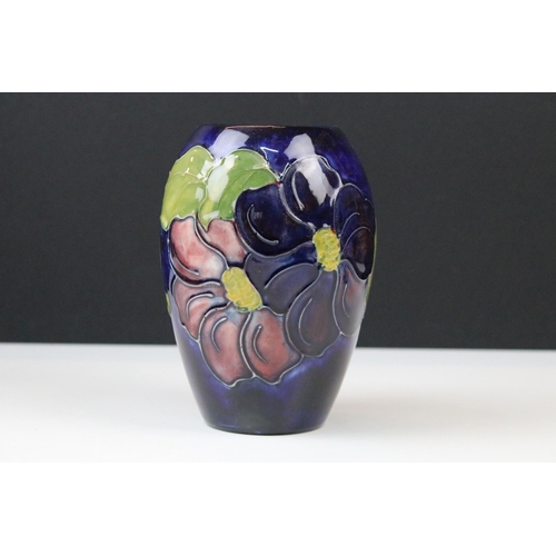 5 - Three Moorcroft vases to include a rose pattern trumpet vase in tribute to Charles Rennie Mackintosh... 