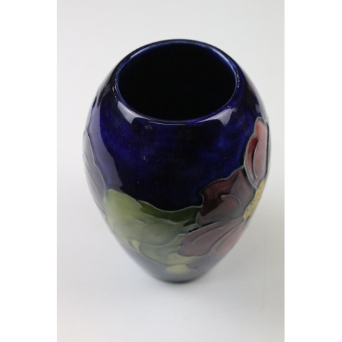 5 - Three Moorcroft vases to include a rose pattern trumpet vase in tribute to Charles Rennie Mackintosh... 