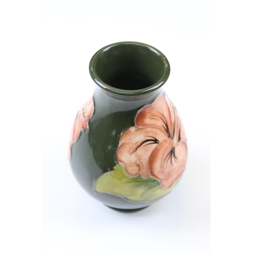 5 - Three Moorcroft vases to include a rose pattern trumpet vase in tribute to Charles Rennie Mackintosh... 