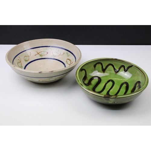 51 - Sidney Tustin at Winchcombe Pottery green glazed bowl, 21cm diameter and a signed studio pottery bow... 