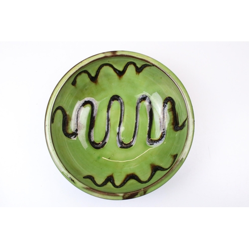 51 - Sidney Tustin at Winchcombe Pottery green glazed bowl, 21cm diameter and a signed studio pottery bow... 