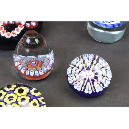 52 - Collection of thirteen millefiori design glass paperweights of mixed shapes and sizes