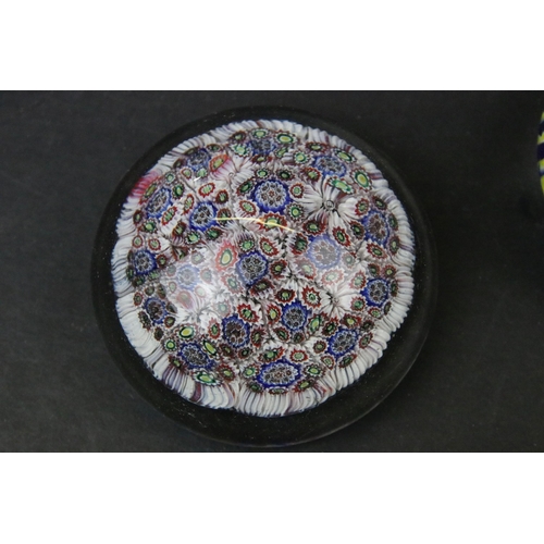 52 - Collection of thirteen millefiori design glass paperweights of mixed shapes and sizes