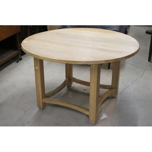 616 - Neptune oak circular dining table with square tapering legs and shaped stretchered supports, 73cm hi... 