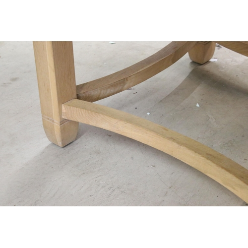 616 - Neptune oak circular dining table with square tapering legs and shaped stretchered supports, 73cm hi... 