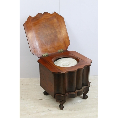 617 - Victorian mahogany commode, with hinged woolwork lid, pottery liner and lid within, the front shaped... 