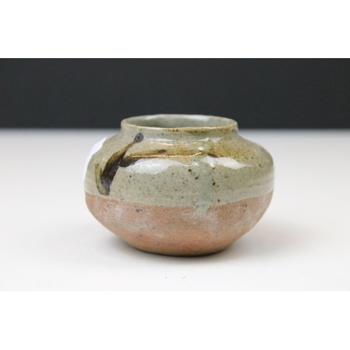 63 - Mike Dodd stoneware yunomi with foliate decoration, impressed mark to base, H 9cm together with six ... 