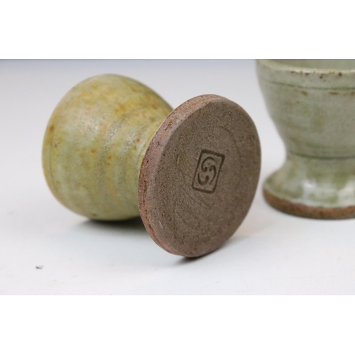 63 - Mike Dodd stoneware yunomi with foliate decoration, impressed mark to base, H 9cm together with six ... 