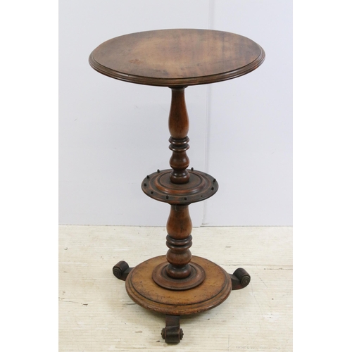 630 - 19th Century mahogany pedestal table having a round top with turned column raised on three scrolled ... 