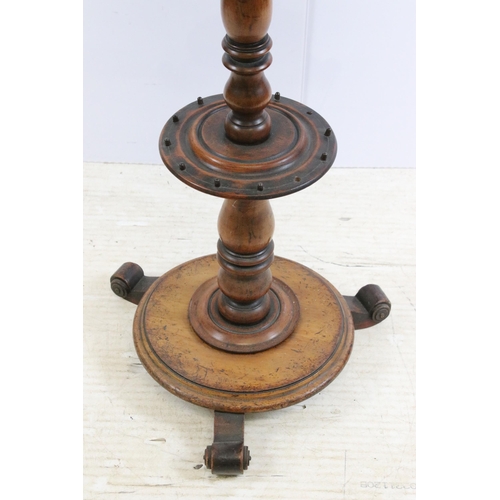 630 - 19th Century mahogany pedestal table having a round top with turned column raised on three scrolled ... 