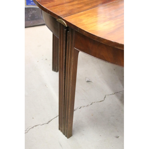 632 - 19th Century mahogany D end extending dining table raised on reeded block legs with two extending le... 