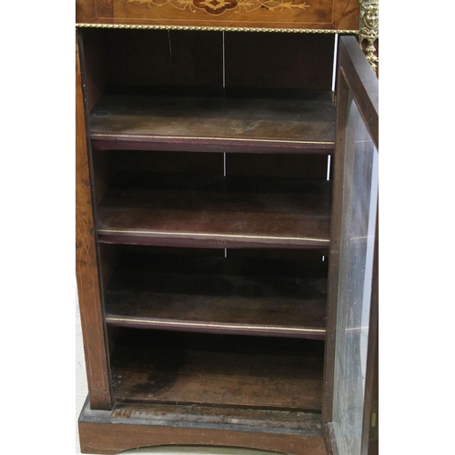 634 - Edwardian walnut and rosewood inlaid music / drinks cabinet, with single glazed door flanked by gilt... 