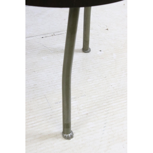 636 - Early / mid 20th century circular brown bakelite occasional table the three steel legs with paw feet... 